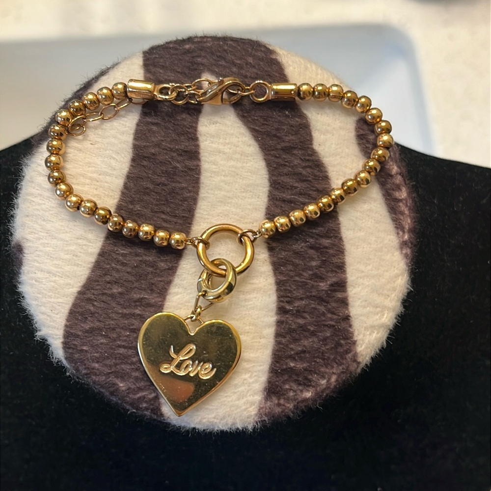 Fossil heart charm with bracelet